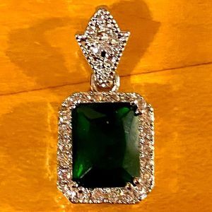 5/$25 Emerald and diamond pendant in silver setting